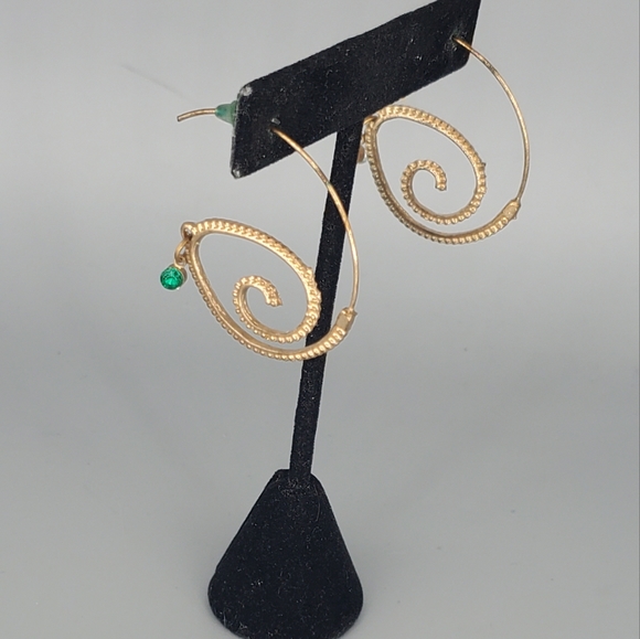 Spiral Green Goldtone Earrings and Cross Black And Green Bracelet - Picture 2 of 12